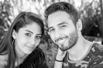 Fototapeta premium Couple in love. Enjoying happy in public park