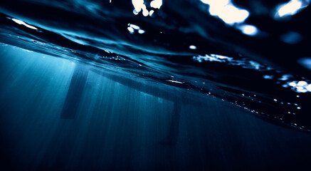 yacht under water in the rays of the sun © Gwidon