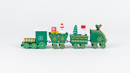 Christmas train toy. Green wood railway.