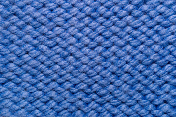 Texture, hand-knitted blue fabric. Reverse stockinette stitch - obrazy, fototapety, plakaty