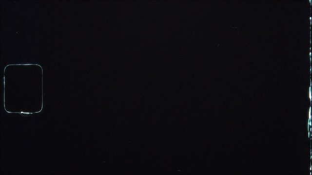 Old super 8mm Film matte overlay with damage and sprocket hole. Film dirt, hair, noise, scratches, and film grain texture. For retro vintage effects and archival footage. Old film strip rolling.