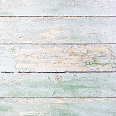 Old wooden natural texture painted, scratched and flaked. Light old wood background from planks. Vintage painted boards.