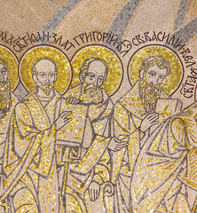 Fototapeta na wymiar Icon of Three Hierarchs: Basil the Great, Gregory the Theologian, John Chrysostom