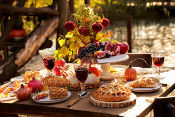 Autumn table with pumpkins and decorations 