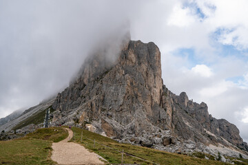 Cloudy Dolomites Gusela mountain, Passo di Giau with peak Ra Gusela. Location place Dolomiti Alps, Cortina d'Ampezzo, South Tyrol, Italy, Europe.