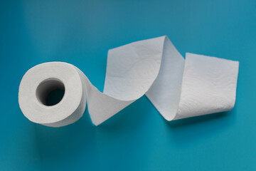 Toilet paper white roll on blue background
