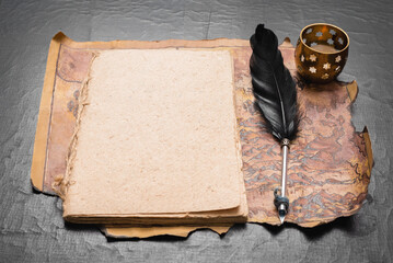 Adventurer diary book template with copy space. Old treasure map and blank page book on the table...