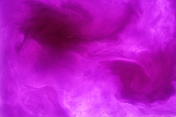 Fototapeta na wymiar purple acrylic ink making shapes in the water