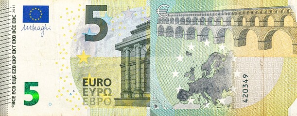 Banknote 5 five euro. Two sides background. Macro view of paper money