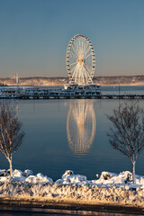 ferris wheel in the morning in winter