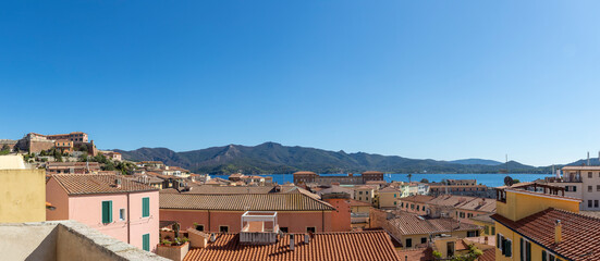 View over the island capital Portoferraio on the island of Elba in Italy under a bright blue sky in summer