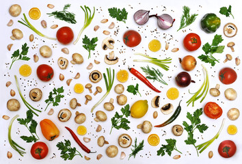 Set  from  fresh vegetables on white background :  tomatoes ,mushrooms ,garlic , chilli , paprika ,onions, lemons.  Healthy vegan food. Top view, flat lay.