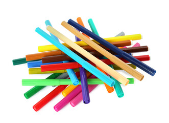 Many colorful markers on white background. School stationery