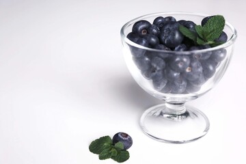 blueberries in a glass bowl