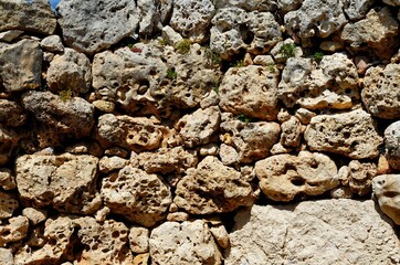 Textured wall of Neolithic megalith temple complex of Ggantija, Gozo island, Malt