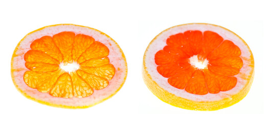 Slice of grapefruit. Fresh juicy organic grapefruit sliced on white surface. Food, fruits and...