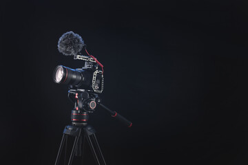 Professional camera gear for cinematography and filmmaking ready to shoot with clean background for text