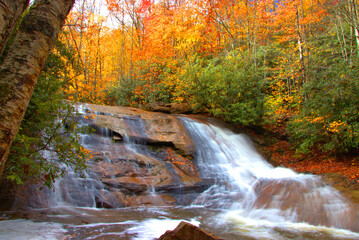 waterfall in autumn forest