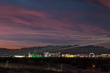 Foto op Plexiglas Las Vegas with night air traffic light trail © John