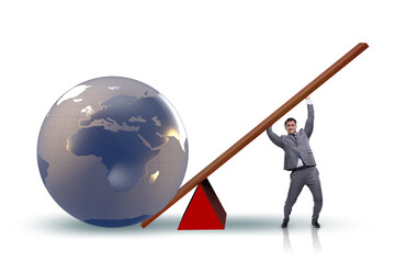 Businessman lifting the earth in challenge concept