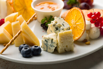 cheese Dor blue macro on plate, close-up.