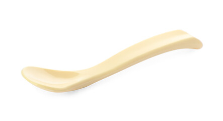 Plastic spoon isolated on white. Serving baby food