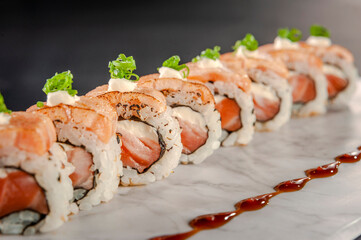 Uramaki blowtorcherd salmon.