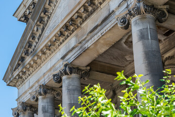 Looking up at Ionic columns and details on an abandon hydro plant in Niagara Falls Ontario Canada.