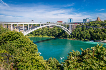 The Rainbow Bridge spans the Niagara River and is a border crossing that joins Niagara Falls...