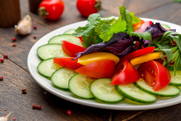 slicing fresh vegetables on a plate macro close up