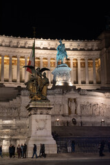 Fototapeta na wymiar Equestrian statue of Victor Emmanuel II in a Piazza Venezia in Rome illuminated at night