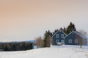 Fototapeta na wymiar A winter countryside landscape in the province of Quebec, Canada