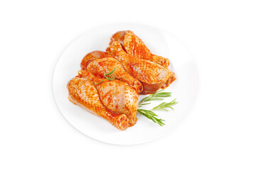Baner.Cooking chicken drumsticks.Raw chicken legs in a marinade with rosemary on a background.Top view, copy space.Isolated.Marinated chicken dramstick with spices for cooking.