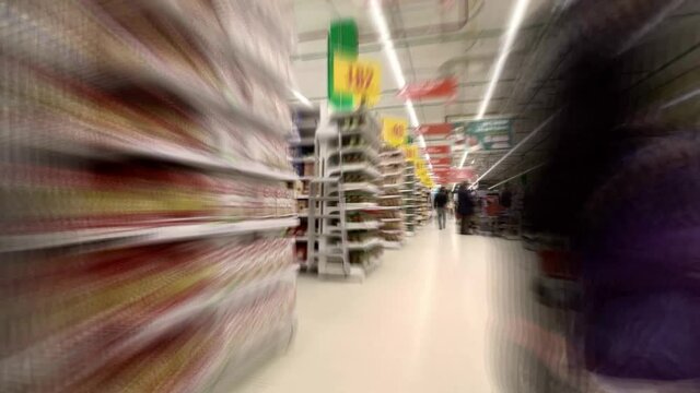 Walk through the shopping hall of a hypermarket, time lapse