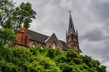 Fototapeta na wymiar St Peters Roman Catholic Church, on a Cloudy Summer Day, Harpers Ferry, West Virginia, USA