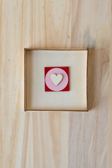 wooden heart isolated in a box