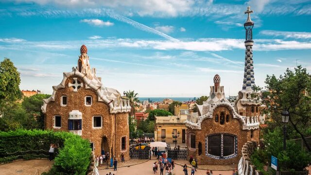 Barcelona, Spain, timelapse view of architectural landmark Park Guell and Barcelona cityscape during summer.