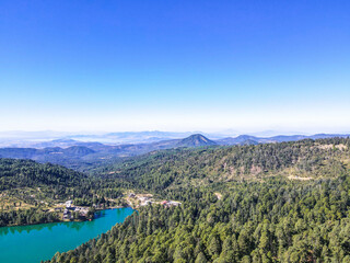 Fototapeta na wymiar Aerial picture of lake and woods, nice day