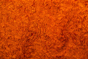 Empty orange fabric background of soft and smooth textile material.High quality photo