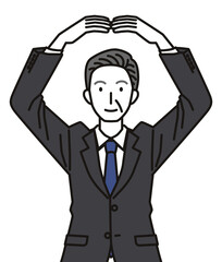 手でまるのジェスチャーをするシニア男性