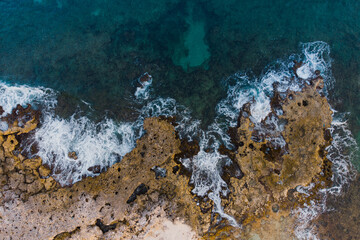 Waves hitting rocks in the bay of Cozumel in Mexico