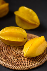 Star fruit on black background. Organic fruit from Thai farmer in local market