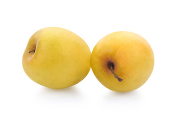 Chinese jujubes with green leaf on white background