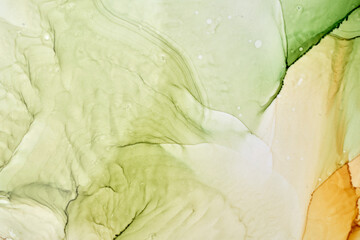 Abstract ocher green watercolor background. Yellow orange brown paint stains and spots in water,...
