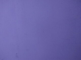 Violet very peri color wall texture background. New 2022 trending color of the year.