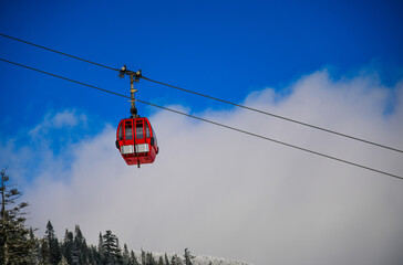 Easy way Gondola lift at Ski Resort. Beautiful winter sunny day.
