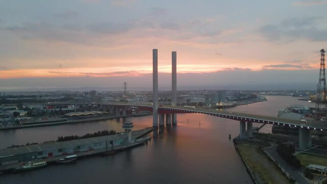 ARIAL: the Bolte Bridge in Docklands Harbour in Melbourne Australia During Sunset. The&nbsp;Bolte Bridge&nbsp;is a large twin cantilever road bridge in Melbourne, Victoria, Australia