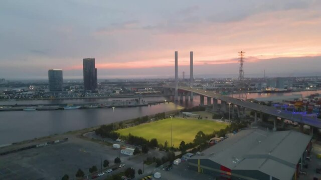 ARIAL: the Bolte Bridge in Docklands Harbour in Melbourne Australia During Sunset. The&nbsp;Bolte Bridge&nbsp;is a large twin cantilever road bridge in Melbourne, Victoria, Australia