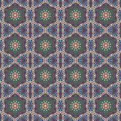 Abstract geometric mosaic seamless pattern. Kaleidoscopic background for trendy textiles. Design for fabric, wallpaper, paper, cover, weaving, packaging, tiles, ceramics.
