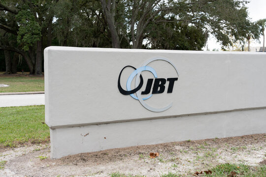Orlando, Fl, USA - January 5, 2022: JBT logo sign at their headquarters in Orlando, Fl, USA.  JBT AeroTech provides ground support and gate equipment to airports and the military. 